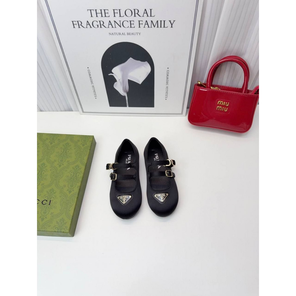 Туфли Prada.