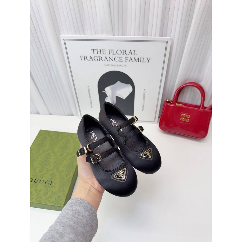 Туфли Prada.