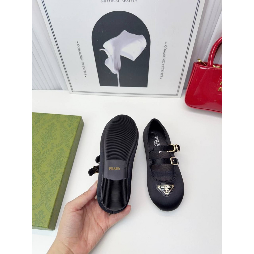 Туфли Prada.